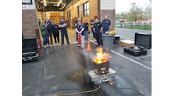 Citizens Fire Academy (CFA) learning why and how firefighters use extinguishers.
