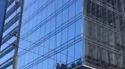 San Francisco firefighters rescued two window washers Wednesday after their rig became stuck outside the 10th floor of the Millennium Tower.