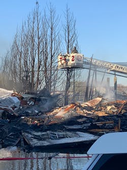 The fire was fueled by high winds, vinyl siding and lightweight construction. It claimed the lives of two occupants and nearly claimed the lives of two firefighters attempting to locate the victims.