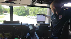 CE-Bar Fire Department Lt. Brandon Burns demonstrates the truck's on-board GPS and computer system that details the emergency and its location.
