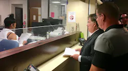 Attorney Joseph Diemert, the lawyer for the Association of Cleveland Fire Fighters, files an affidavit Friday with Cleveland Municipal Court swearing out a misdemeanor criminal charge against Cleveland Fire Chief Angello Calvillo. The fire union has accused Calvillo of violating terms of the city charter and demanded his dismissal. Diemert is seen with Francis Lally, a fire lieutenant and president of the fire union.