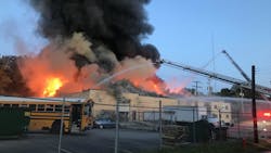 Columbus, OH, firefighters battle a two-alarm fire at an industrial building on the city&apos;s near east side Friday night.