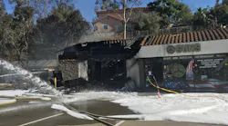 An Escondido, CA, firefighter was injured when a roof collapsed while battling a fire at a dry cleaners Wednesday.