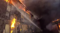 Fresno, CA, firefighters battled a three-alarm blaze at an apartment complex near Fresno State on Sunday.