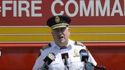 Hamilton, Ontario, Canada, Fire Chief Dave Cunliffe talks at a press conference after a firefighter was injured after a fall while trying to rescue stranded hikers Wednesday.