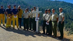About two dozen California firefighters dedicated a memorial for Draper City, UT, Battalion Chief Matthew Burchett, who died last year battling the Ranch wildfire.
