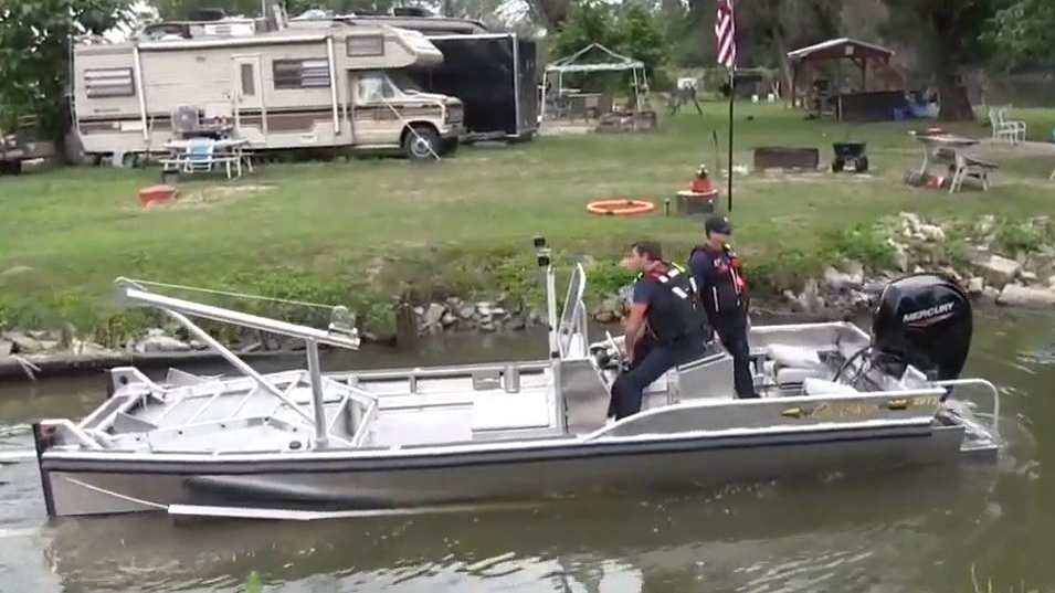 Ottumwa, IA, firefighters give their new river rescue boat a test drive Thursday.