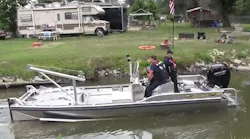 Ottumwa, IA, firefighters give their new river rescue boat a test drive Thursday.