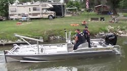Ottumwa, IA, firefighters give their new river rescue boat a test drive Thursday.