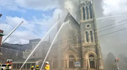 Around 75 to 100 Philadelphia firefighters responded Tuesday to a massive multi-alarm fire at the Great Bible Way Temple in West Philadelphia.