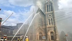 Around 75 to 100 Philadelphia firefighters responded Tuesday to a massive multi-alarm fire at the Great Bible Way Temple in West Philadelphia.
