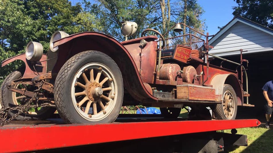 The 1915 Cadillac touring car was turned into a firefighting vehicle by mill workers before it was purchased for $1 by the Taftville, CT, Fire Company #2 in the 1950s.