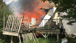 A twin-engine plane crashed into a Union Vale, NY, house Saturday, killing the pilot and an occupant in the home.