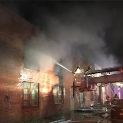 FDNY crews battle a four-alarm warehouse fire in Brooklyn early Thursday. Five firefighters were injured in the blaze.