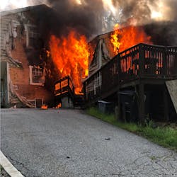 Two Nashau, NH, firefighters suffered minor injuries battling a three-alarm blaze Sunday. Two Nashau, NH, firefighters suffered minor injuries battling a three-alarm blaze Sunday.