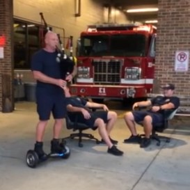 Nashville, TN, firefighter Tim Mathes aka 'the HoverPiper' plays the bagpipe while riding a hoverboard.