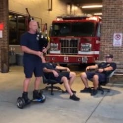 Nashville, TN, firefighter Tim Mathes aka &apos;the HoverPiper&apos; plays the bagpipe while riding a hoverboard.