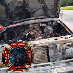 An off-duty firefighter who was driving a water truck used what he was carrying to extinguish a pickup fire in Tuscarawas Township on Monday.