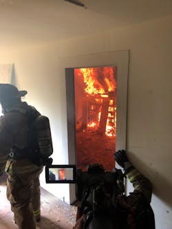 The entire drill was recorded. This image shows the live-fire room showing with the fire load. The entire drill was recorded. This image shows the live-fire room showing with the fire load.