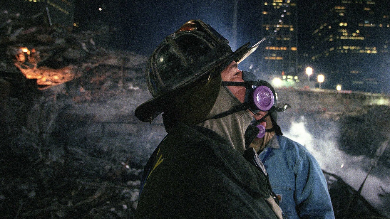 FDNY firefighter Joey Esposito works at Ground Zero in lower Manhattan in December 2001 searching for victims of the 9/11 terror attacks.