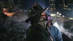 FDNY firefighter Joey Esposito works at Ground Zero in lower Manhattan in December 2001 searching for victims of the 9/11 terror attacks.