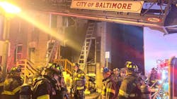 Baltimore City firefighters rescued two residents from a two-alarm fire in East Baltimore's Patterson Park neighborhood late Monday. Baltimore City firefighters rescued two residents from a two-alarm fire in East Baltimore's Patterson Park neighborhood late Monday.