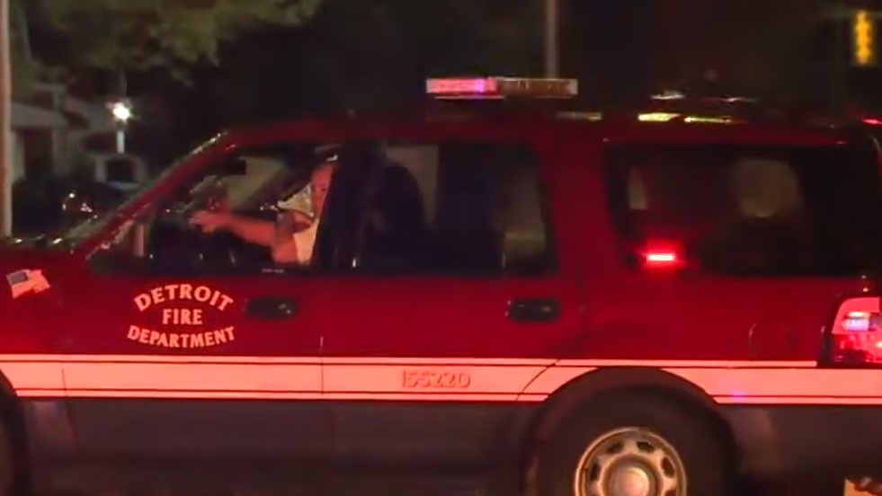 A four-alarm fire at a Detroit retirement home injured a firefighter, two police officers and four residents Monday night.