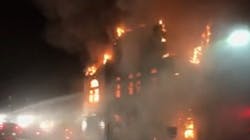 A Duluth, MN, was injured when he was hit by falling debris while battling a blaze at 117-year-old synagogue early Monday.