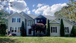 Three firefighters were injured while battling a two-story house fire Tuesday in East Greenwich, RI. Three firefighters were injured while battling a two-story house fire Tuesday in East Greenwich, RI.