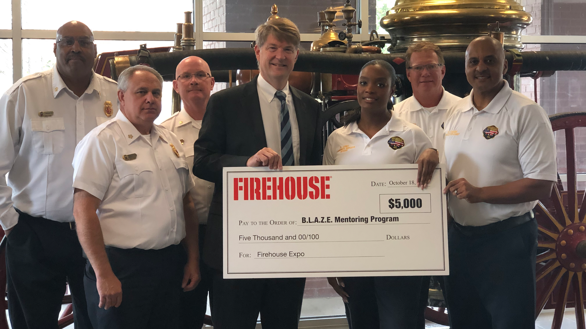 Firehouse Magazine donates $5,000 to the BLAZE Mentoring Program.