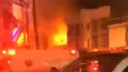 A New Brunswick, NJ, firefighter suffered a knee injury battling a fire that broke out at a smoke shop early Monday.