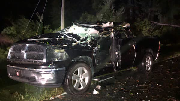 A Northwood, NC, firefighter was trapped and injured when a tree struck his personal pickup truck as he was driving to the fire station as part of the department's Hurricane Dorian response.