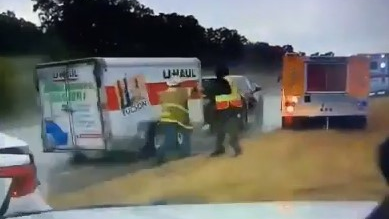 A police dashboard camera captured graphic footage of an out-of-control trailer crashing into two Stringtown, OK, firefighters.