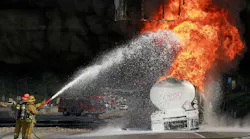 Los Angeles County firefighters put foam on a gasoline tanker which caught fire in Montebello, CA, in December 2011.