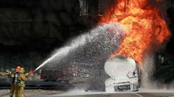 Los Angeles County firefighters put foam on a gasoline tanker which caught fire in Montebello, CA, in December 2011.