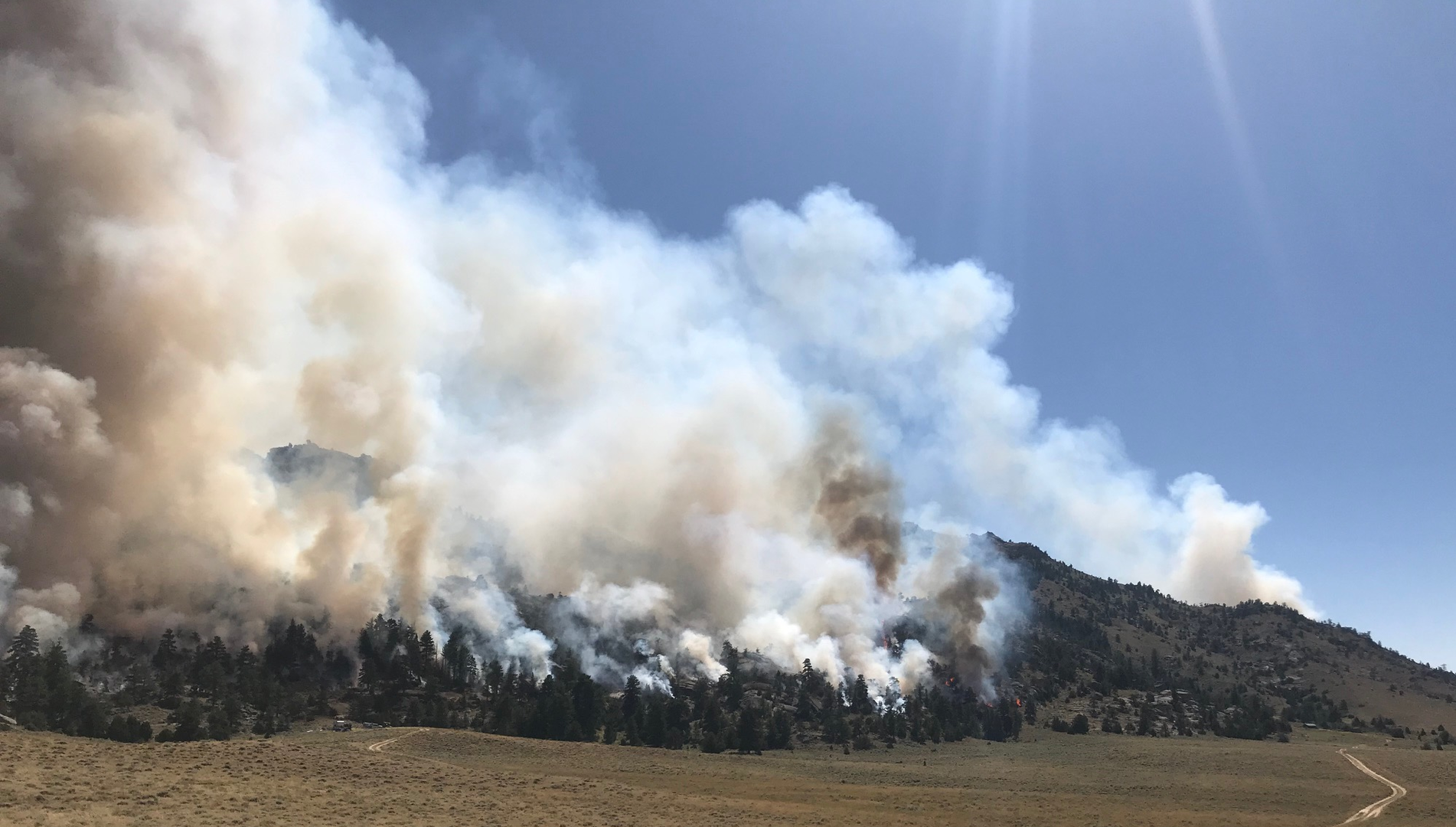 The Pedro Mountain wildfire near Wyoming's Pathfinder Reservoir has destroyed at least seven structures and burned nearly 20,000 acres.