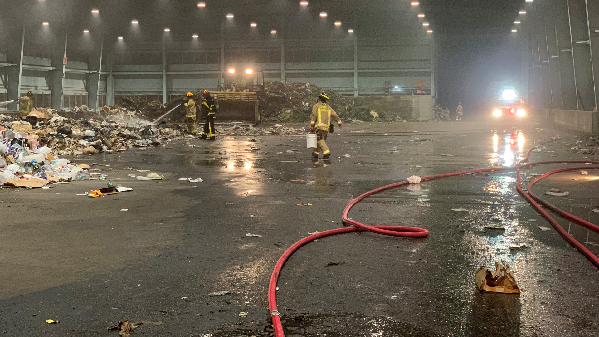 Firefighters from four departments battled a garbage blaze at a Seminole County, FL, transfer station early Thursday.