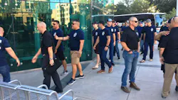 Firefighters from Stockton, CA, and throughout San Joaquin County, arrive Tuesday at the County Administration Building after marching together in solidarity from Station 2. Many of them addressed the county Board of Supervisors to express their views against a policy from the county's Emergency Medical Services Agency, calling it 'an attack on the fire agencies' ability to deliver emergency medical services to the citizens we serve.'