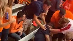 A Syracuse football fan went into cardiac arrest during a game against Clemson on Saturday, Sept. 14, 2019, and fellow spectator Michael Cominolli captured video of a firefighter reviving him.