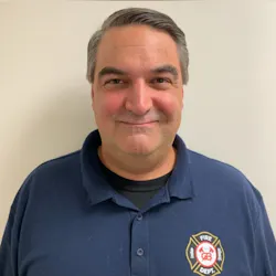 New Grand Blanc, MI, Assistant Fire Chief Charles Farley.