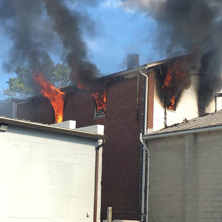 Firefighters from at least seven or eight departments battled a blaze that broke out on the second floor of a building in Hampstead, MD, on Wednesday.