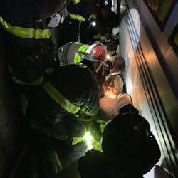 San Francisco firefighters rescued a man using a walker after he fell onto the tracks Sunday at a Bay Area Rapid Transit station and became pinned against the platform by an oncoming train. San Francisco firefighters rescued a man using a walker after he fell onto the tracks Sunday at a Bay Area Rapid Transit station and became pinned against the platform by an oncoming train.