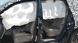 The anti-ejection design of this roof airbag system allows it to deploy and remain firm and seemingly fully inflated long after the initial drop down of the airbag. Note the 'fat' parts and the 'thin' parts of the airbag itself. Photos by Ron Moore