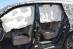 The anti-ejection design of this roof airbag system allows it to deploy and remain firm and seemingly fully inflated long after the initial drop down of the airbag. Note the 'fat' parts and the 'thin' parts of the airbag itself. Photos by Ron Moore The anti-ejection design of this roof airbag system allows it to deploy and remain firm and seemingly fully inflated long after the initial drop down of the airbag. Note the 'fat' parts and the 'thin' parts of the airbag itself. Photos by Ron Moore