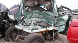 This minivan crash shows that rear liftgates could jam and obstruct access to patients trapped inside. The two manual lifter struts on this liftgate will have to be dealt with if the rescue team is to accomplish total liftgate removal. Photos by Ron Moore