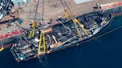 The burned hulk of the Conception is brought to the surface by a salvage team in the Santa Barbara Channel off of Santa Cruz Island, Calif., on Thursday, Sept. 12, 2019.