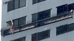 Atlantic City, NJ, firefighters rescued two workers who were hanging six stories off the ground from a malfunctioning scaffold Monday. Atlantic City, NJ, firefighters rescued two workers who were hanging six stories off the ground from a malfunctioning scaffold Monday.