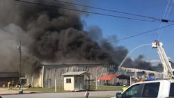 Firefighters from multiple departments continue to battle a massive blaze at a paper products warehouse in Attalla, AL, that has burning for a little more than a day. Firefighters from multiple departments continue to battle a massive blaze at a paper products warehouse in Attalla, AL, that has burning for a little more than a day.
