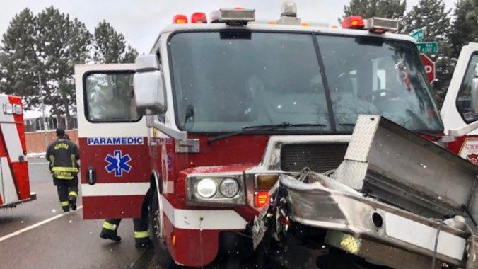 Four Aurora, CO, firefighters were injured when their apparatus was hit by another vehicle Sunday while responding to a medical emergency.