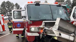 Four Aurora, CO, firefighters were injured when their apparatus was hit by another vehicle Sunday while responding to a medical emergency.